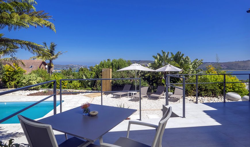 TheBloem Suite Two - The private balcony is furnished and offers amazing views of the Knysna Lagoon. TheBloem Suite Two - The private balcony is furnished and offers amazing views of the Knysna Lagoon.
