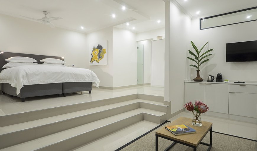 TheBloem Suite One - The bedroom consists of a king size bed that can be converted into two twin beds with a TV with satellite channels. TheBloem Suite One - The bedroom consists of a king size bed that can be converted into two twin beds with a TV with satellite channels.