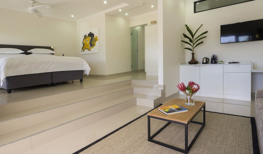 TheBloem Suite One - The bedroom consists of a king size bed that can be converted into two twin beds with a TV with satellite channels. TheBloem Suite One - The bedroom consists of a king size bed that can be converted into two twin beds with a TV with satellite channels.