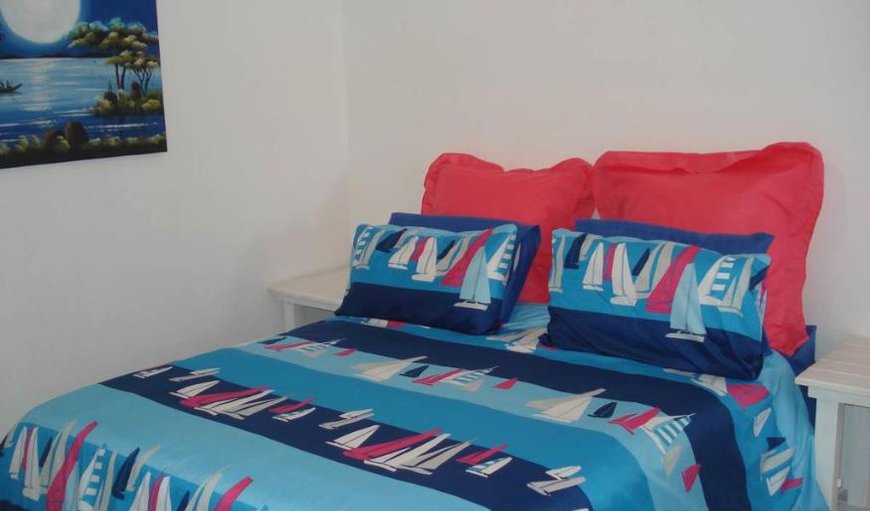 Uvongo Square 2: The bedroom is comfortably furnished with a double bed.