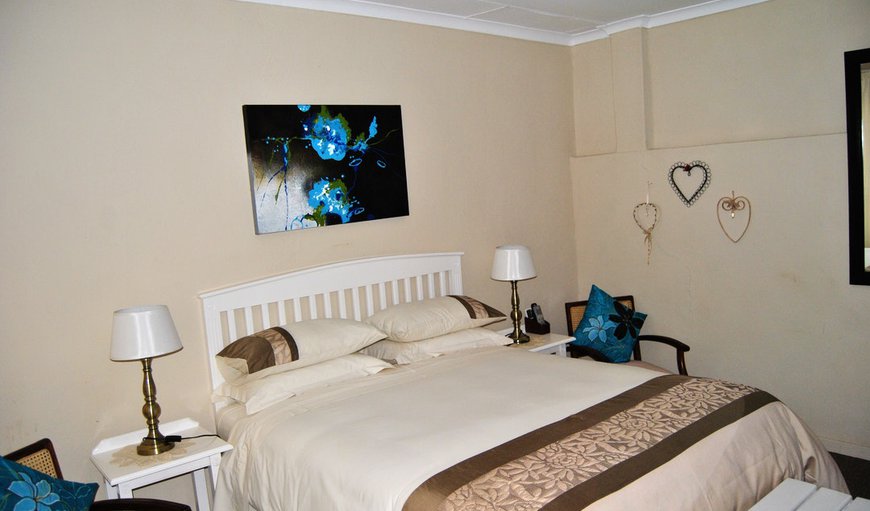 Room 3: Room 3 - This bedroom is furnished with a queen size bed and a single bed