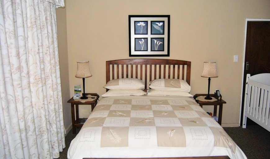 Room 4: Room 4 - This bedroom is beautifully furnished with a queen size bed