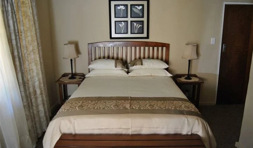 Room 4: Room 4 - This bedroom is beautifully furnished with a queen size bed