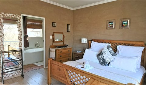Honeymoon Suite: Honeymoon Suite - King bed, Bathroom with a bath and shower, Aircon