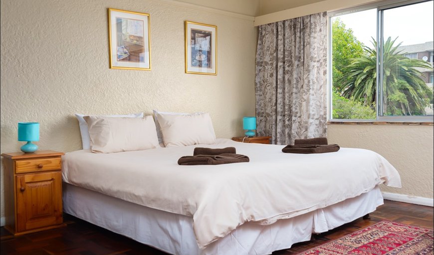 The bedroom is furnished with two single beds or a king size bed and a TV with selected DSTV channels. The bedroom is furnished with two single beds or a king size bed and a TV with selected DSTV channels.