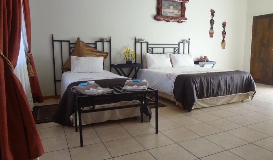 Lodge Suites - These suites are each furnished with a double bed and a 3/4 bed with an en-suite bathroom. Lodge Suites - These suites are each furnished with a double bed and a 3/4 bed with an en-suite bathroom.
