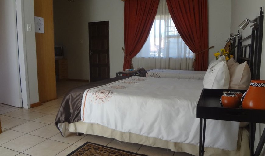 Lodge Suites - These suites are each furnished with a double bed and a 3/4 bed with an en-suite bathroom. Lodge Suites - These suites are each furnished with a double bed and a 3/4 bed with an en-suite bathroom.