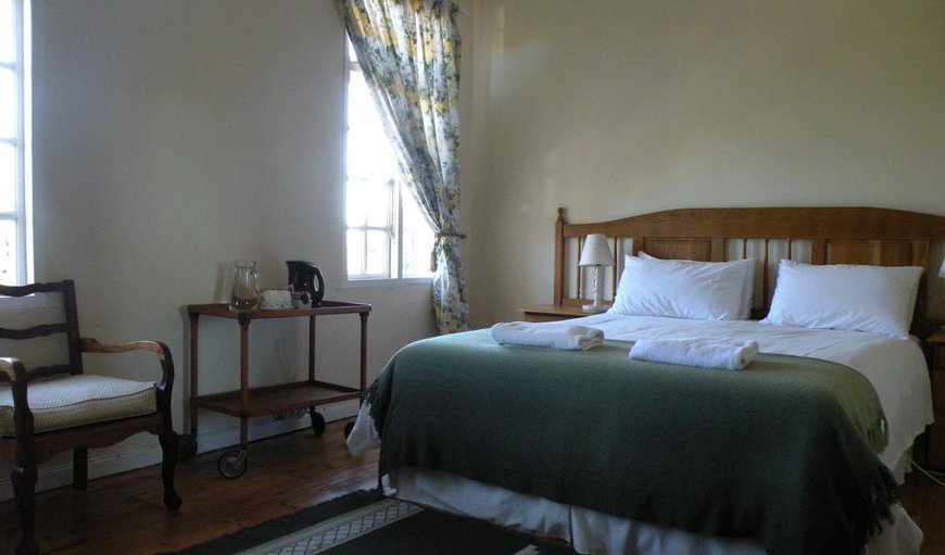 Standard Double or Twin Room with Shared Bathroom: Standard double or twin room bedroom.