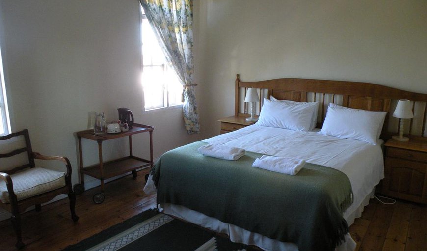 Standard Double or Twin Room with Shared Bathroom: Standard double or twin room bedroom.