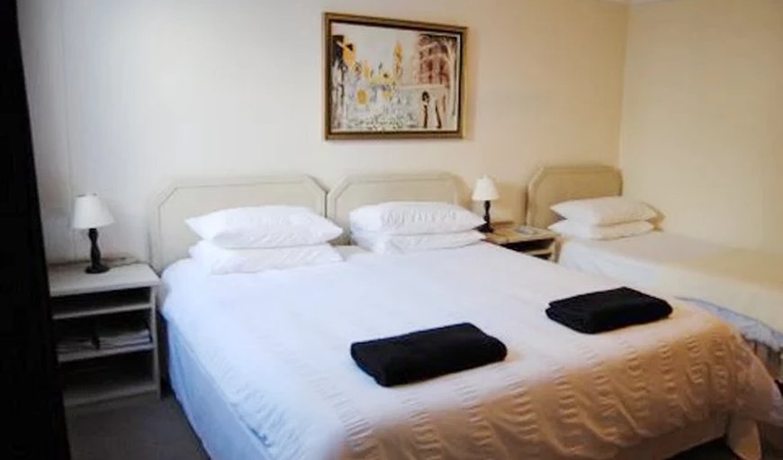 En-suite Rooms: En-suite room with king size bed and single bed.