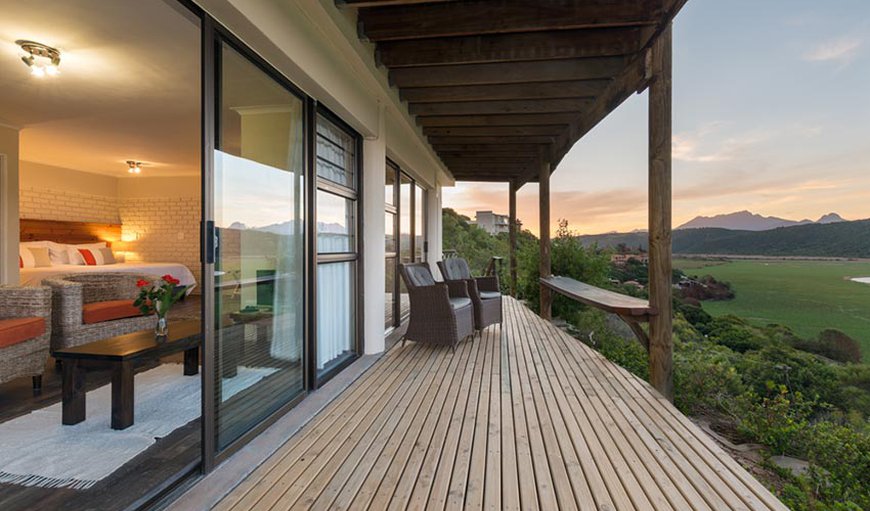 Sunbird suite - (honeymoon suite): Sunbird balcony view of the Island Lake and Outeniqua Mountain.