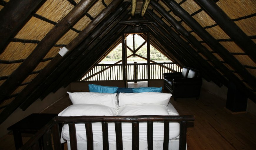Self Catering Thatched roof Chalets: Self Catering Chalet Bedroom