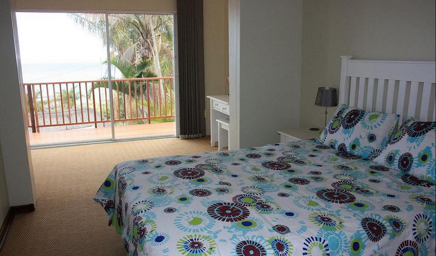 36 Hibiscus Road (3 bedroom, 8 sleeper self catering house): Main bedroom with double bed and Patio 