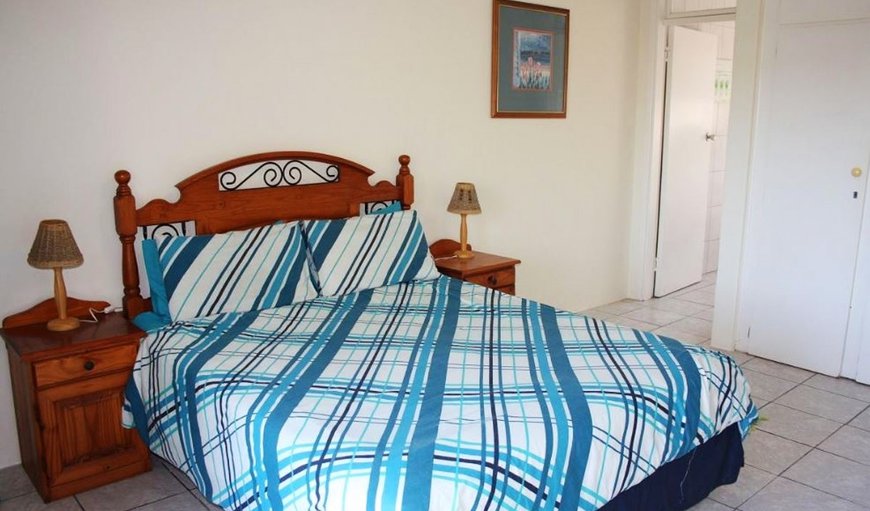 Unit 8 (3 bedroom, 8 sleeper self catering duplex townhouse): The main bedroom is furnished with a queen size bed and has a small balcony and an en-suite bathroom.
