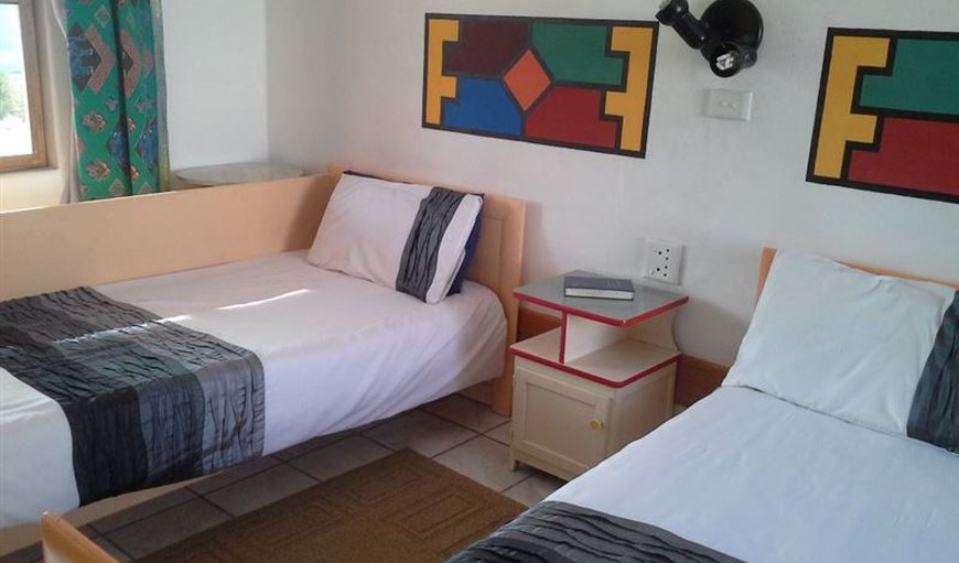 Twin Room: This room has two single beds and an en-suite bathroom.