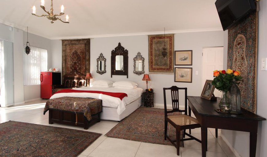 The Arabesque Room is both exotic and spacious. It offers a King-sized bed and also leads directly onto the pool-deck