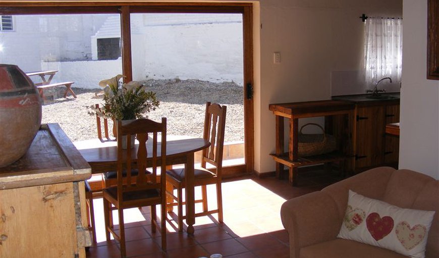 Pepper Tree Cottage lounge and kitchen area.