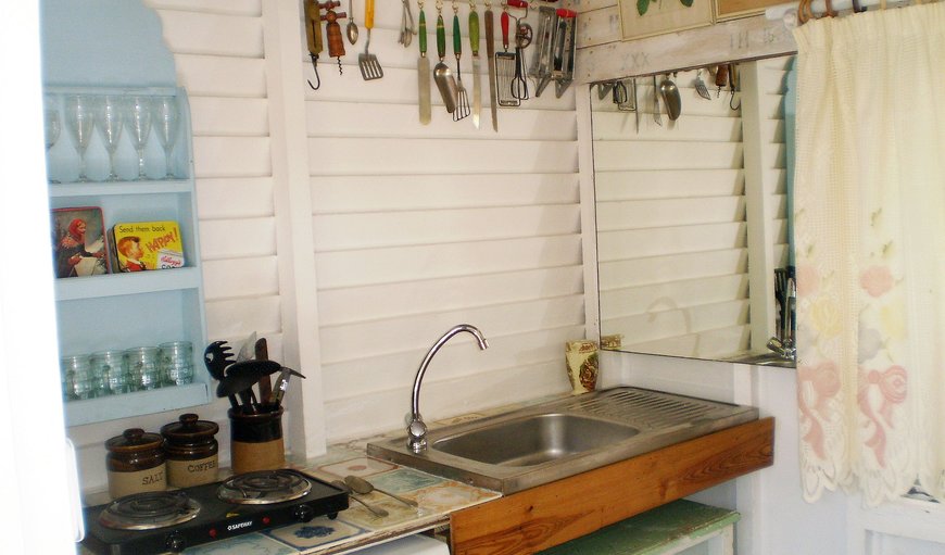 The Sink in the old kitchen is recycled and the working space has been created from beautiful old vintage tiles The Sink in the old kitchen is recycled and the working space has been created from beautiful old vintage tiles