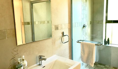Double Budget Room - Aircon, WIFI & TV: Bathroom with a shower