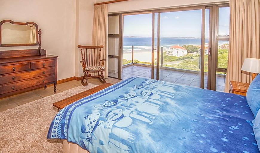 Beach Houses: Master bedroom with en-suite bathroom has sliding doors opening up on to a covered balcony perfect for viewing whales and dolphins.