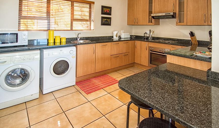 Master bedroom with en-suite bathroom has sliding doors opening up on to a covered balcony perfect for viewing whales and dolphins. Master bedroom with en-suite bathroom has sliding doors opening up on to a covered balcony perfect for viewing whales and dolphins.