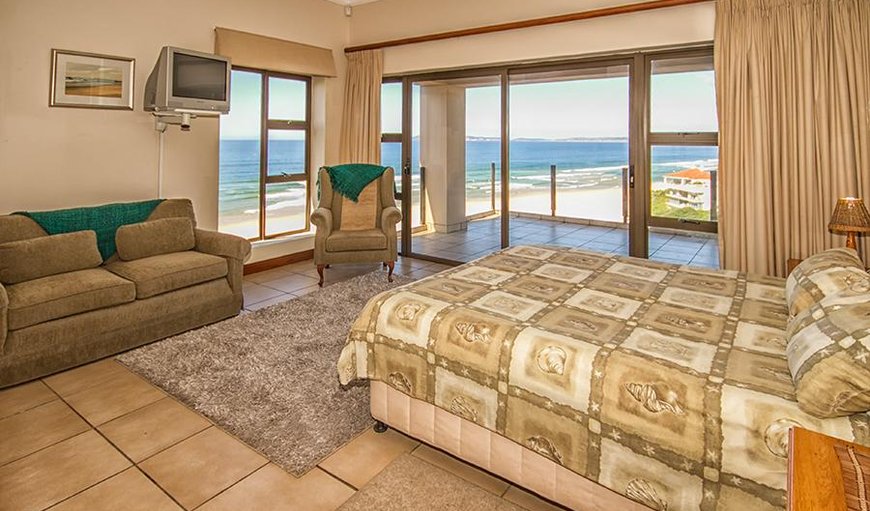Master bedroom with en-suite bathroom has sliding doors opening up on to a covered balcony perfect for viewing whales and dolphins. Master bedroom with en-suite bathroom has sliding doors opening up on to a covered balcony perfect for viewing whales and dolphins.