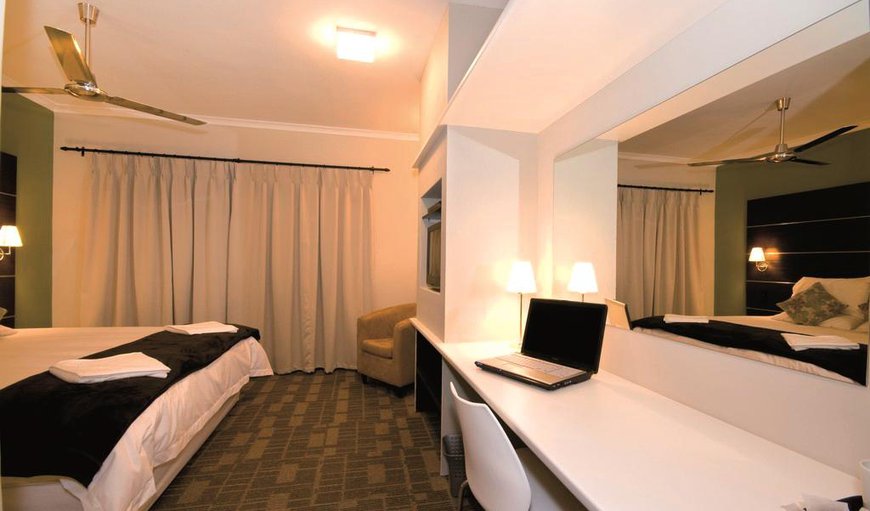 Standard King Room: The spacious King Room has a King-sized bed
