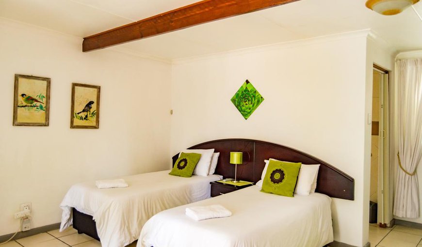 The Twin Bedrooms are spacious and has 2 single 3/4 beds