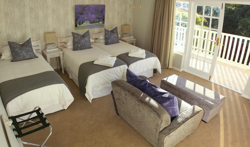 Room 4 Jacaranda: The Jacaranda Room has 3 single beds with an en-suite bathroom