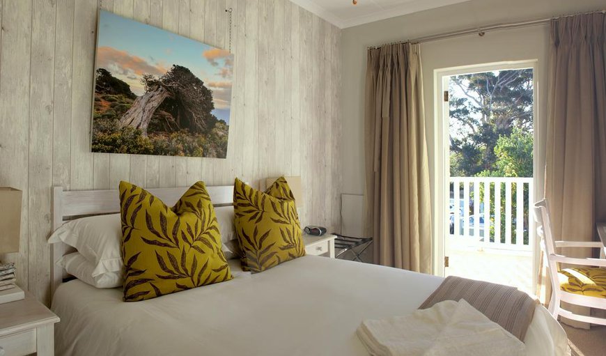 Room 1 Juniper: The Juniper Room has a double bed with a balcony