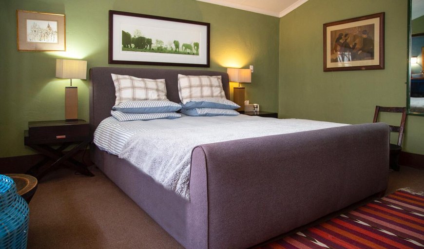 House: Two of the bedrooms are each furnished with a king size bed, one of which is a rondavel