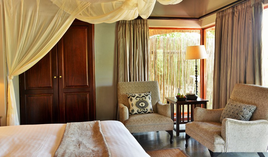 Imbali Safari Lodge: A mosquito net envelops the entire bed in the evening ensuring you are cocooned in comfort. Expect a bedtime story on your pillow or a sweet treat to enjoy before retiring for the night.