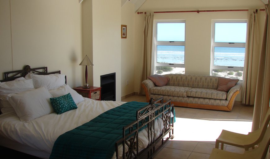 Beach House: Bedrooms with king-size bed and en-suite.