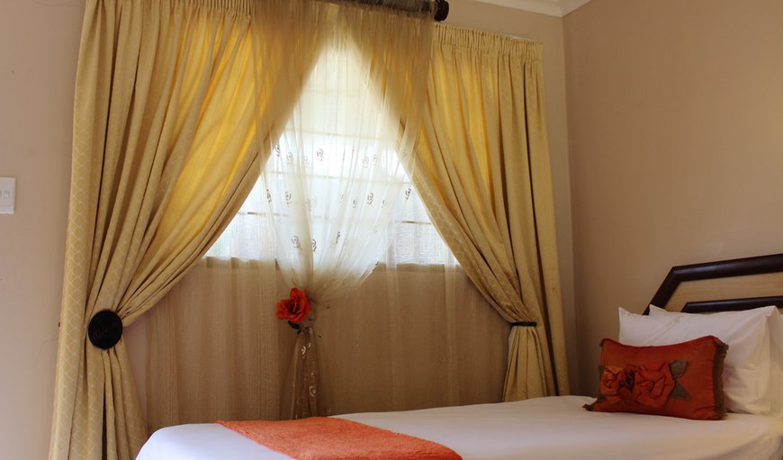 Room 1: Room 1 - This room is furnished with two single beds and has a shower.