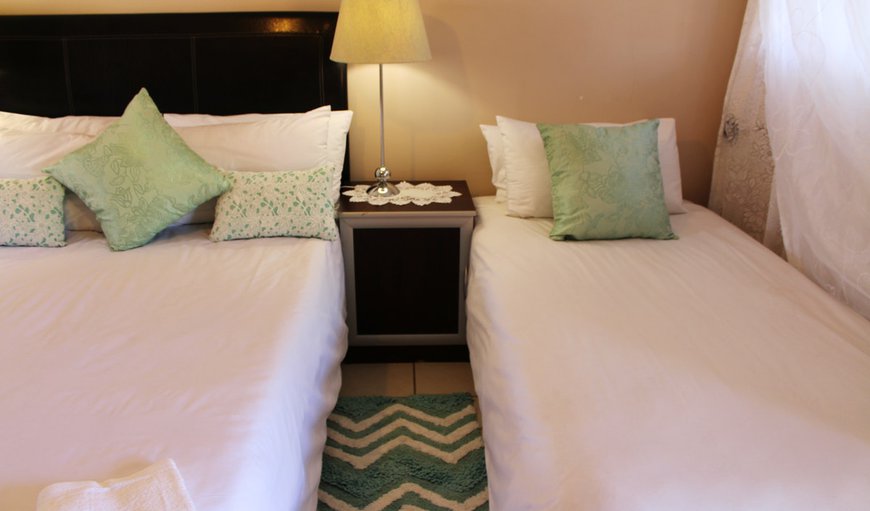 Room 3: Room 3 - This bedroom is furnished with a double bed and a single bed with a shower.
