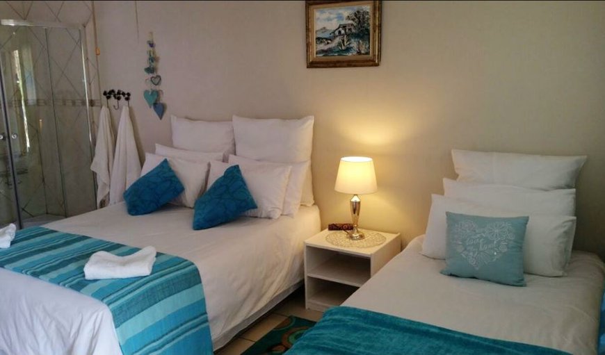 Room 2: Room 2 - This room is comfortably furnished with a double bed and a single bed with a shower.
