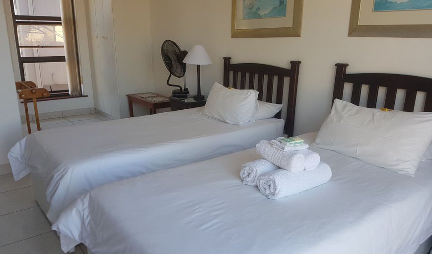 Standard - Tulip - This bedroom offers 2 single beds, 2 pull out single beds and a bathroom with a shower and a toilet Standard - Tulip - This bedroom offers 2 single beds, 2 pull out single beds and a bathroom with a shower and a toilet