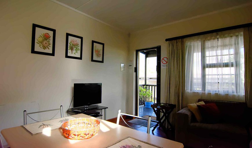 One Bedroom Unit: lounge in s/c 1 bedroom unit with double bed