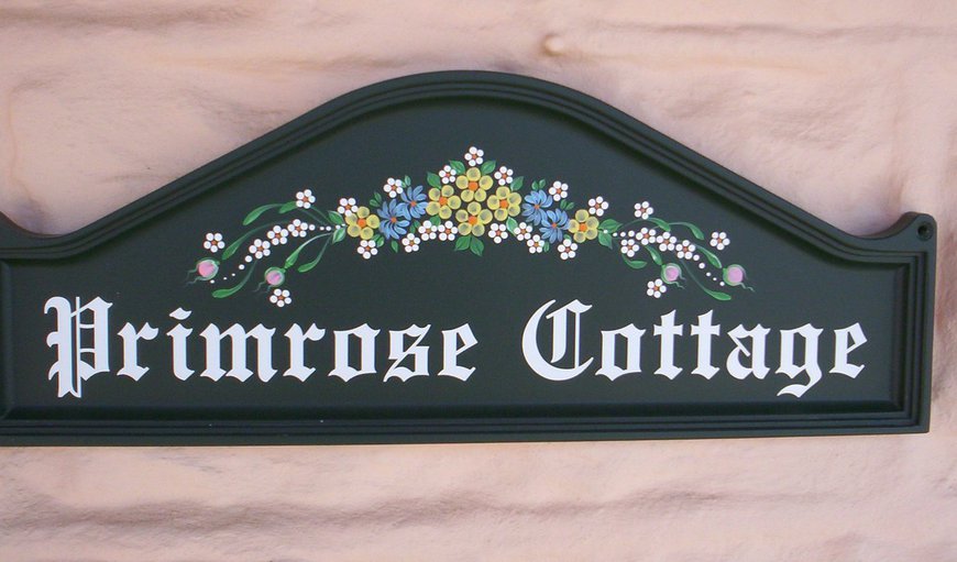 Lovely sign of cottage.