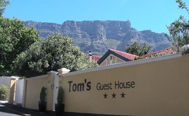 Tom's Guest House image