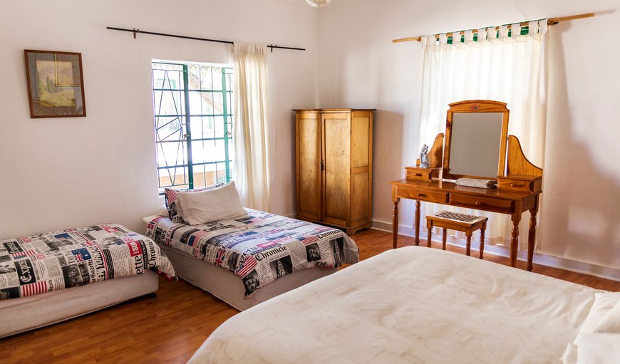 Room 4 is a family room with 1 x double bed and 2 x single beds with an en suite bathroom with a shower. In summer all rooms are equipped with fans to keep you cool and in winter the beds have electric blankets and heaters in the rooms. Room 4 is a family room with 1 x double bed and 2 x single beds with an en suite bathroom with a shower. In summer all rooms are equipped with fans to keep you cool and in winter the beds have electric blankets and heaters in the rooms.