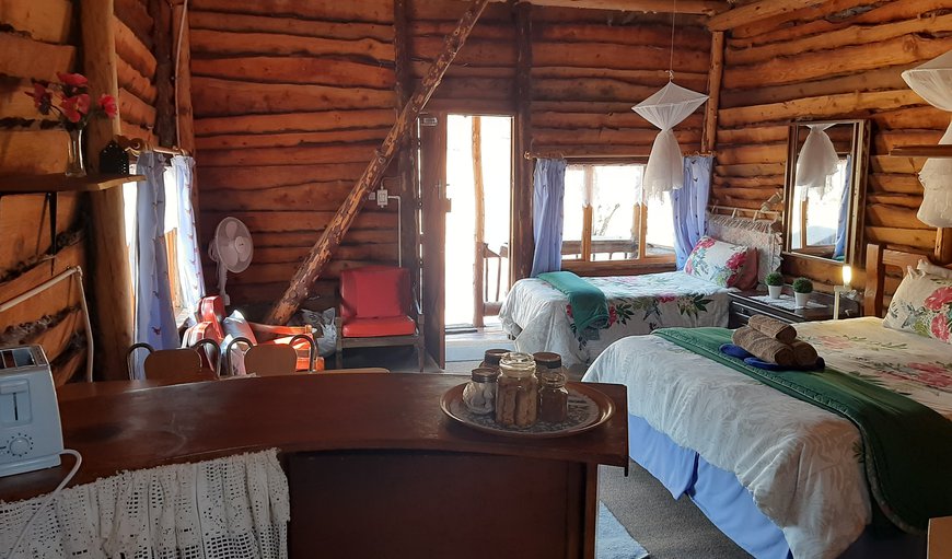 View from the kitchenette of the entire room - sleeping, dining and lounge area, leading to a private little balcony through a stable door. View from the kitchenette of the entire room - sleeping, dining and lounge area, leading to a private little balcony through a stable door.
