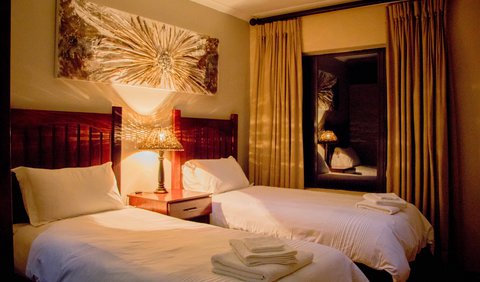 African Safari Lodge | Impala Suite: Main Lodge - Bedroom