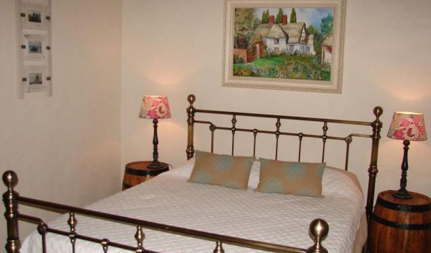 Holiday Home: This bedroom is furnished with a queen size bed
