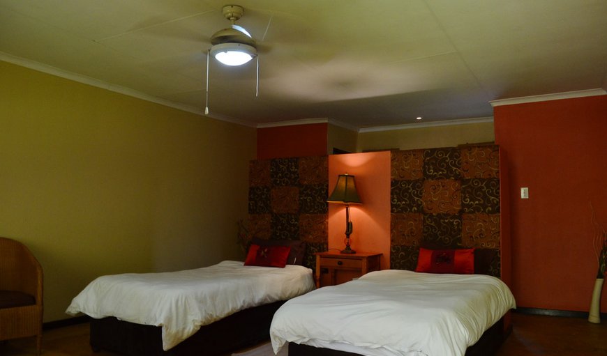 Single Room: Large Single Room - This room contains two single beds with an en-suite bathroom.