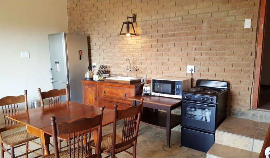 The Family Apartment - The kitchen is equipped with a fridge, stove, microwave, toaster and a kettle. The Family Apartment - The kitchen is equipped with a fridge, stove, microwave, toaster and a kettle.
