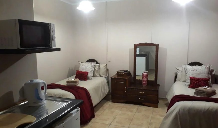 Twin Room - 2 Sleeper: Twin Room - 2 Sleeper - Bedroom with 2 single beds