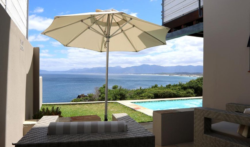 West Room: The sea-facing West Room is outside of the guest house, downstairs at the pool area. The patio has a good view over the pool deck and sea shore. This patio is protected from the summer winds, and is the perfect place to relax on a summers day.