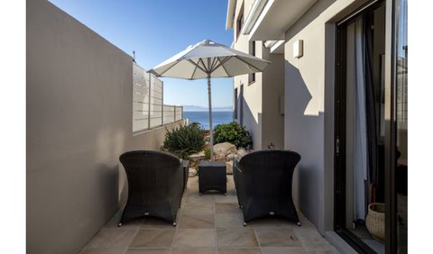 South Room: South Room - outside sitting area that overlooks an aloe garden and the ocean.