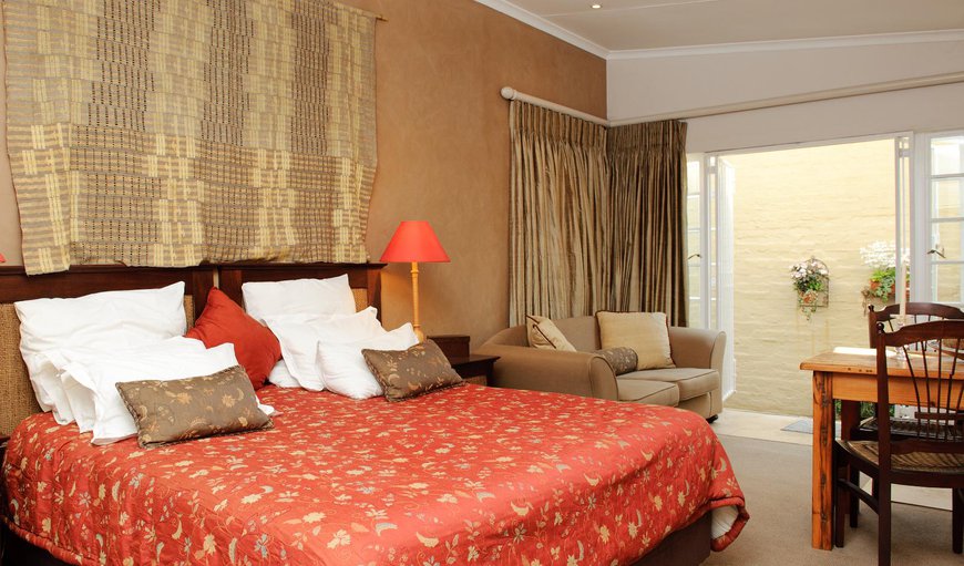 Studio Flatlet King/twin(Ochre) - Bedroom with a king size bed or twin beds and a double sleeper couch Studio Flatlet King/twin(Ochre) - Bedroom with a king size bed or twin beds and a double sleeper couch